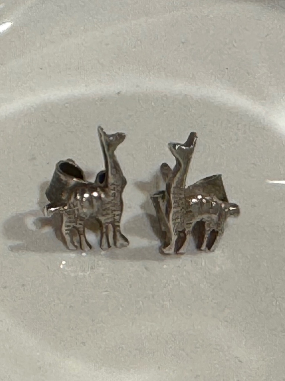 Tiny silver llama earrings